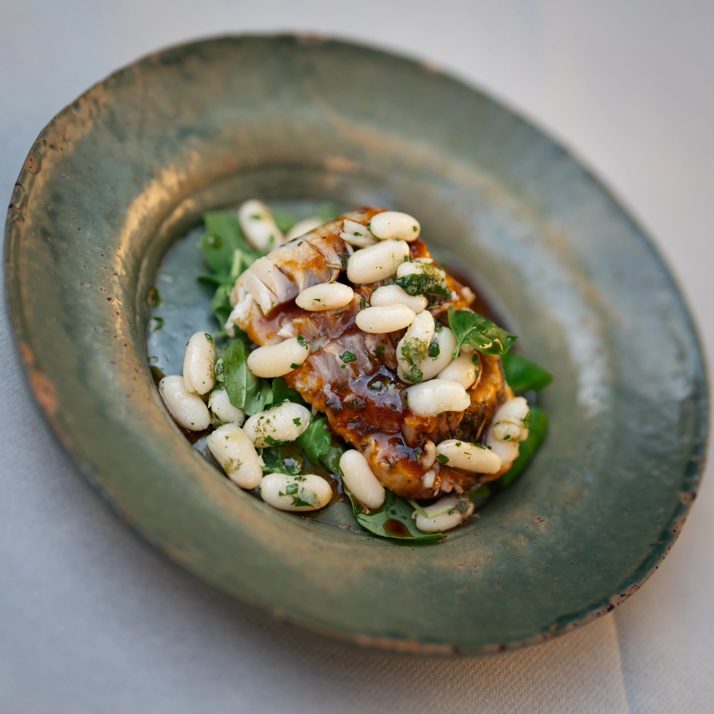 Pesce con fagioli, piatto di Opera